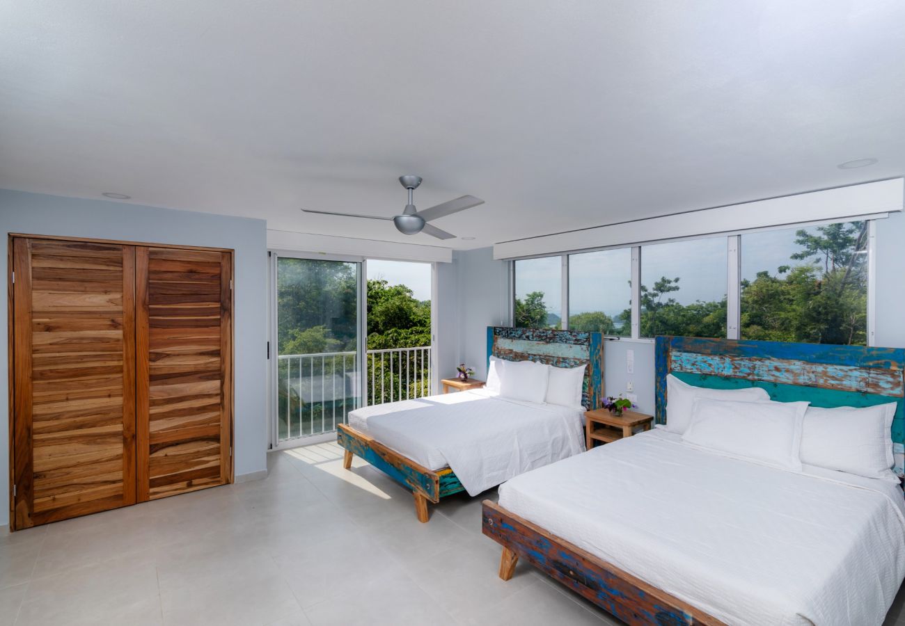 Villa Costa Vida — the pool deck above the rainforest